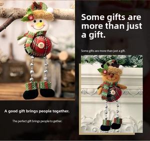 Christmas snowman and elk plush pendants with beaded legs hanging on a festive tree branch
