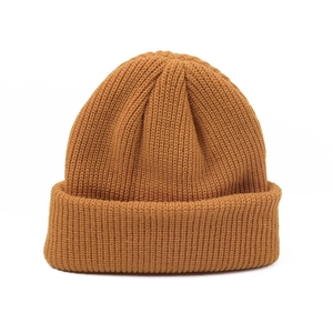 Classic caramel knit cuff beanie featuring a warm ribbed texture and minimalist retro style