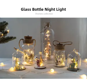 Detail view of Nordic Christmas glass lamps with wooden carvings and LED lights