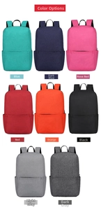 Selection of casual travel backpacks in eight vibrant colors with durable canvas texture