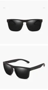 Polarized sports sunglasses featuring matte black frames and green detail accents