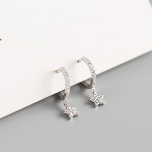 Close-up of S925 sterling silver star hoop earrings with sparkling cubic zirconia stones
