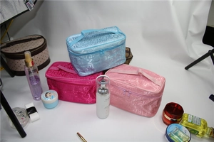 Three colorful large capacity cosmetic bags with handles and stylish letter patterns