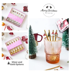 Christmas stainless steel spoon set with enamel charms in a pink festive gift box