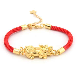 Red braided cord bracelet with golden PiXiu charm and adjustable star pendant