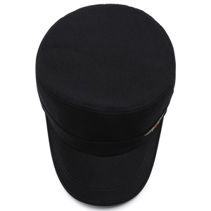 Minimalist black cotton flat top cadet cap with twill texture and short brim in top view