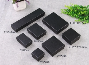 Detailed view of black textured jewelry boxes in various sizes with dimensions marked