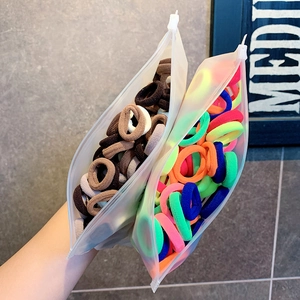 High elastic hair ties set in frosted zipper bags with earth and colorful tones