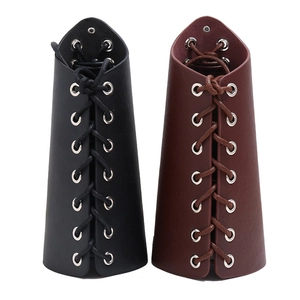 Detail of medieval faux leather arm guards with metal eyelets and cross-lacing design
