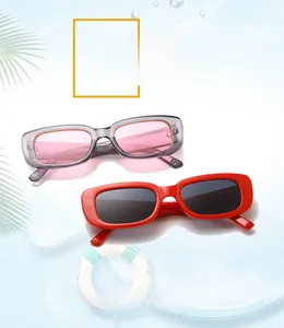 Close-up of rectangular retro sunglasses with integrated nose pads and rounded temples
