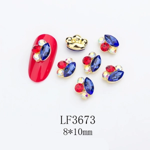 Macro shot of 8x10mm alloy crown nail charm with rhinestones for manicure art
