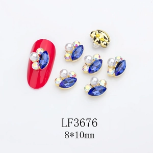 Detail of LF3676 nail art charms with blue marquise crystals and white pearls, 8x10mm size