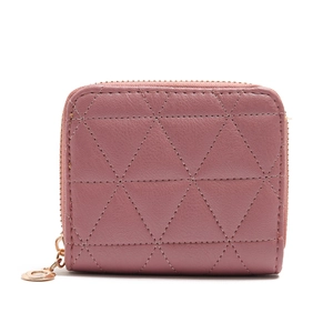 Close-up of pink quilted PU leather mini wallet with gold zipper and metal pendant