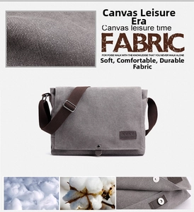 Detail of gray canvas messenger bag with durable texture and metal magnetic snap buckle