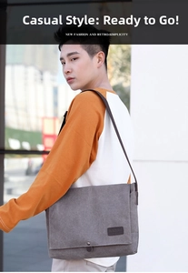 Model wearing a gray canvas messenger bag with adjustable strap for daily commute