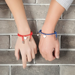 Matching braided PU rope couple bracelets with silver heart pendants in red and blue