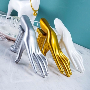 Resin hand-shaped jewelry display stand for rings and necklaces in gold, silver and white