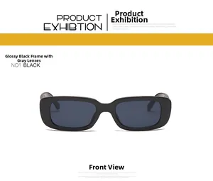 Front view of trendy small rectangular sunglasses with glossy black frame and grey lenses