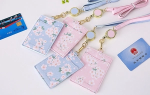 Pink and blue PU leather badge holders with Sakura pattern and retractable lanyards