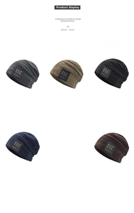 Detailed view of knitted winter hats in five colors with a square leather brand patch