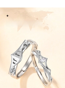 Close-up of Princess and Knight silver rings with pear-shaped zircon and bridge design