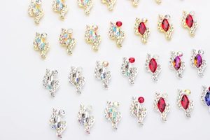 Detailed macro view of marquise cut nail crystals with gold and silver metal bases