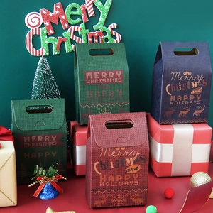 Christmas gift boxes in green, red, and blue with festive Merry Christmas prints