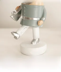 Detail showing the seamless cohesion and refined silver uniform of the nutcracker soldier