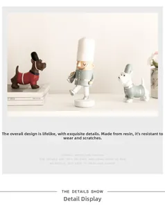 Three nutcracker soldier resin figurines and small dogs on a decorative shelf with books