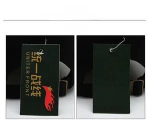 Detail of black military cap tags showing brand logo and laundry care instructions