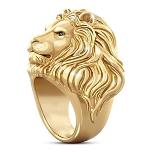 Detailed macro view of lion head ring with gold plating and sparkling black diamond eyes