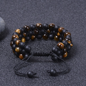 Three-layer tiger eye and matte stone braided bracelet with adjustable cord closure