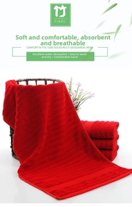 Macro detail of red bamboo fiber wedding towels with elegant wave texture pattern