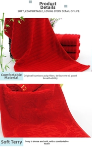 Detail of red bamboo fiber wedding towel showing soft loop texture and floral embroidery
