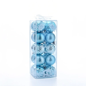 Detail of sky blue 5cm Christmas baubles in matte, glossy, and glitter textures in a box