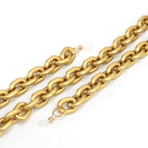 Close-up of gold chunky link glasses chain with clear silicone anti-slip ends