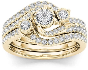 Elegante set di tre anelli placcati in oro con zircone rotondo e dettagli in pavé