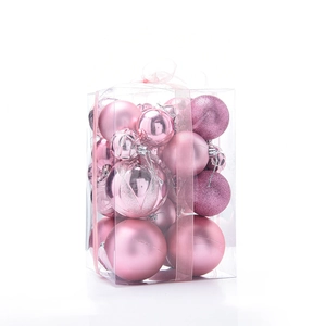 Pink Christmas ball ornaments in various textures packed in a transparent gift box
