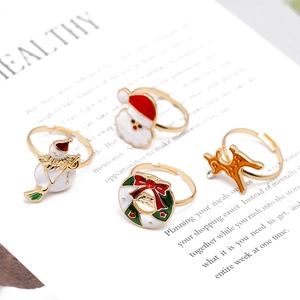 Festive Christmas adjustable ring set featuring Santa, snowman and reindeer designs