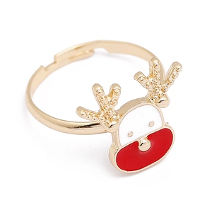 Detailed macro view of a reindeer Christmas ring with red and white enamel on a gold band
