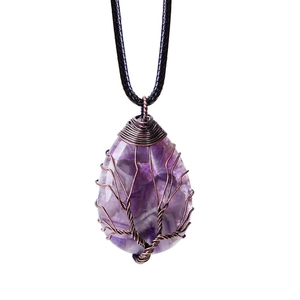 Close-up of wire-wrapped tree of life purple amethyst gemstone teardrop necklace