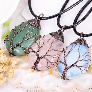 Handcrafted tree of life pendants in green, pink and white stone with copper wire wrap