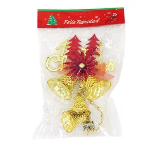 Christmas tree hanging bells with golden hollow ornaments and red glitter flower decorations