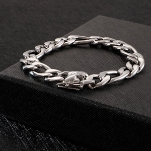Polished silver stainless steel Cuban link bracelet with a micro-pave zircon clasp feature