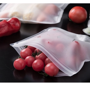 Detailed view of reusable EVA food grade storage bags filled with fresh cherry tomatoes.