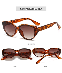 Three perspectives of retro tortoiseshell cat eye sunglasses with brown gradient lenses
