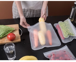 Reusable EVA food storage bags used for fresh vegetables in a kitchen setting.