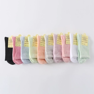 Set of ten colorful solid cotton crew socks for women with original brand tags