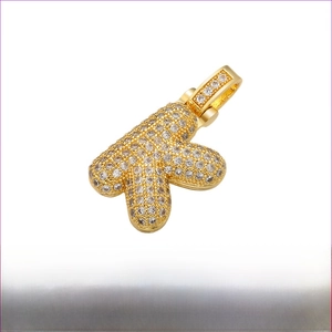 Detailed view of bubble K letter gold pendant with AAA cubic zirconia in 20mm x 29mm size