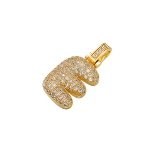 Close-up of golden letter E pendant encrusted with sparkling clear cubic zirconia stones